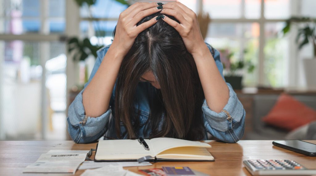 Why Do People Go Into Debt? Common Causes Explained